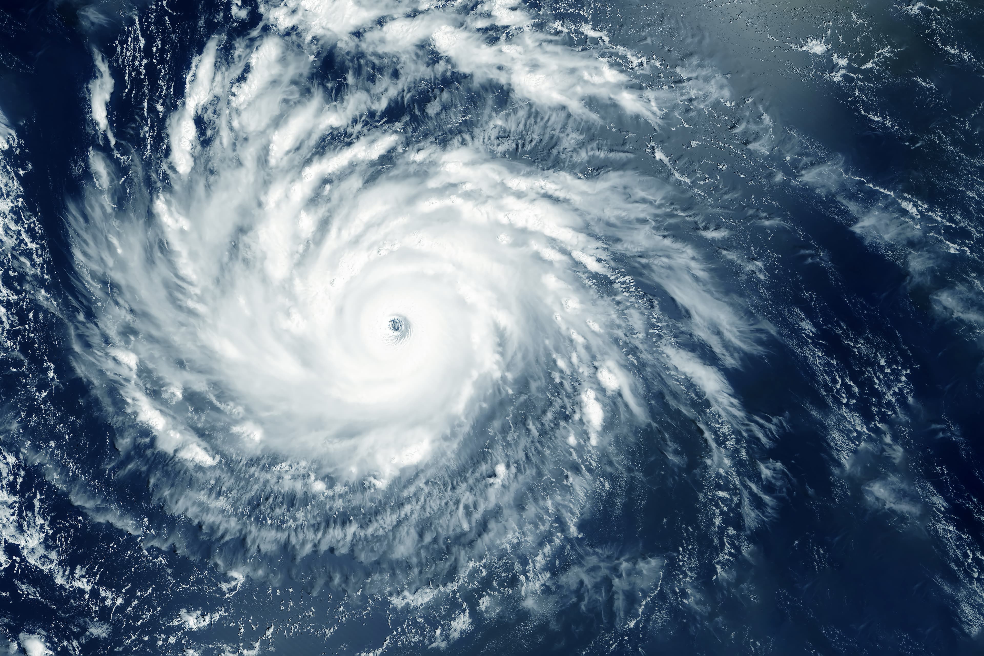 Satellite view of a cyclone forming over the ocean