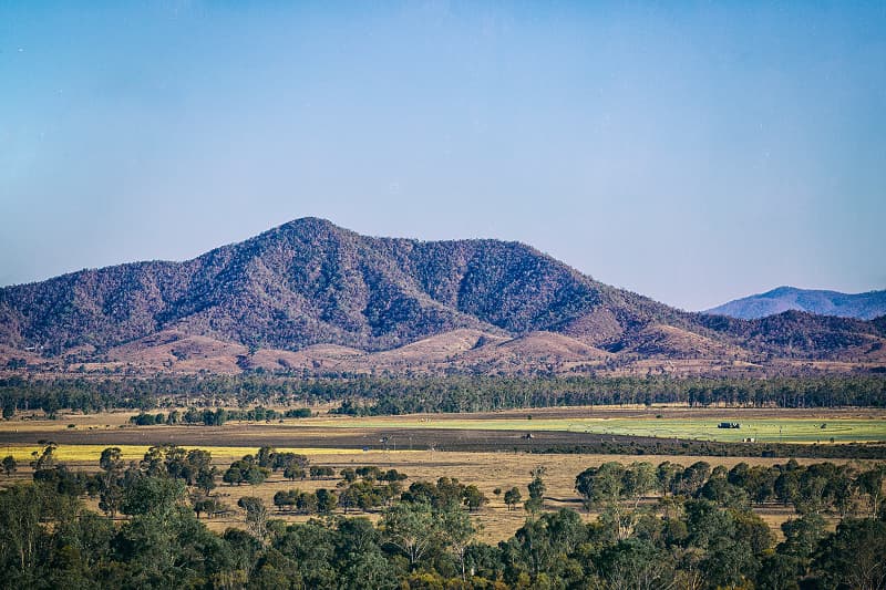 Mountain ranges overlooking farmland in regional Queensland